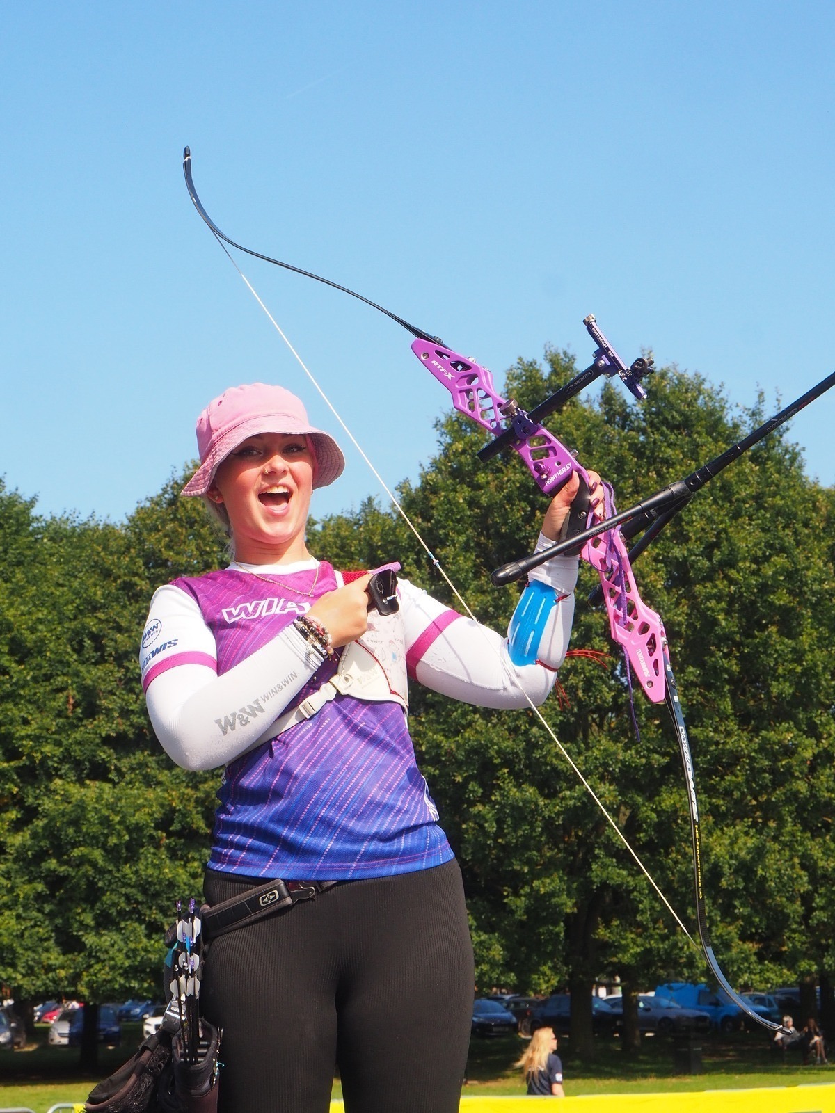 Penny Healey poses with her bow after winning the National Tour Final 2023