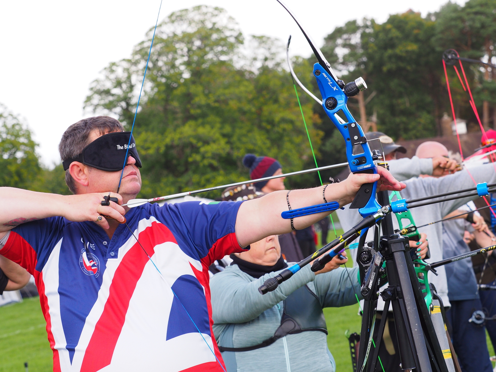 Clive Jones doing archery at a competition
