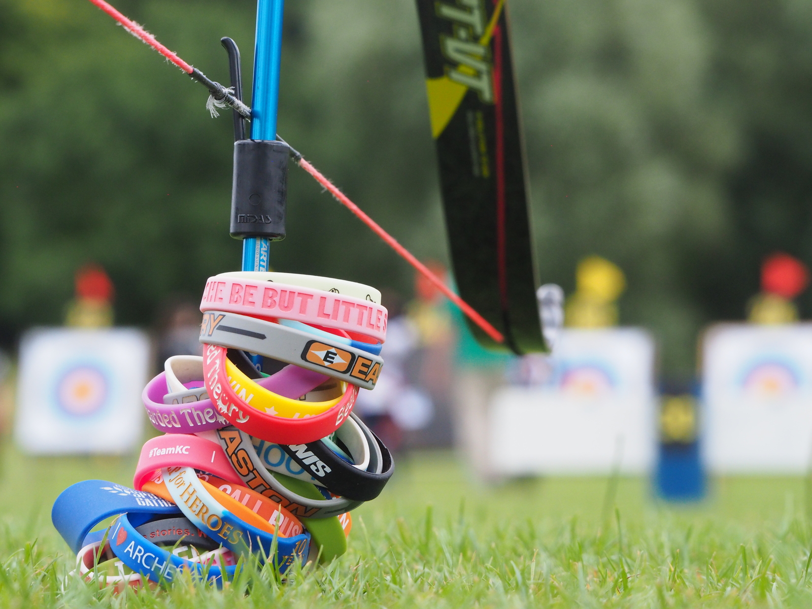 Wristbands on the ground on a range