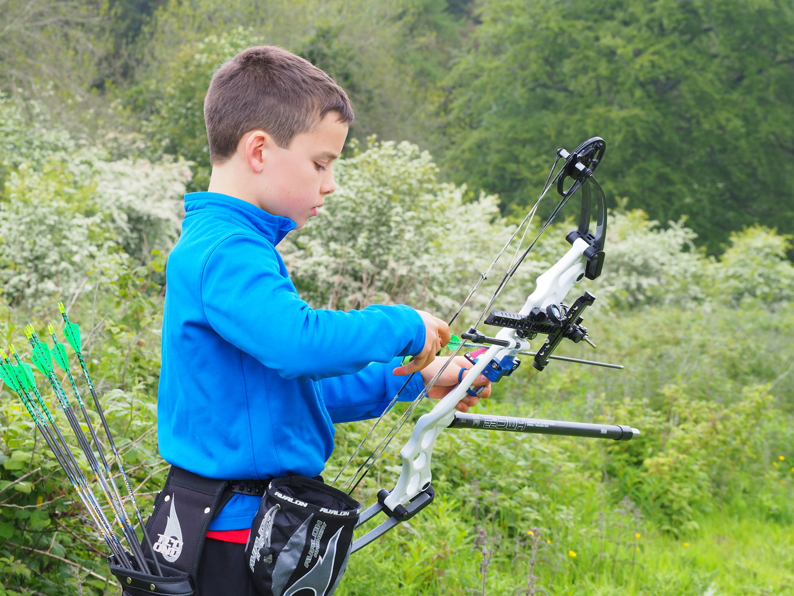 Young archer at a field competition