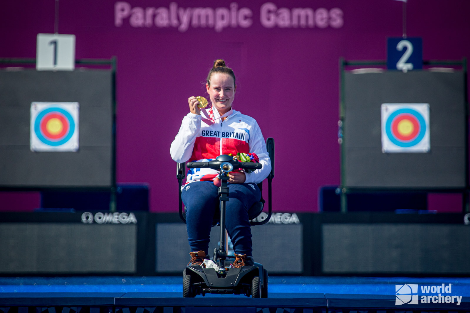 Phoebe Paterson Pine with her gold medal in Tokyo