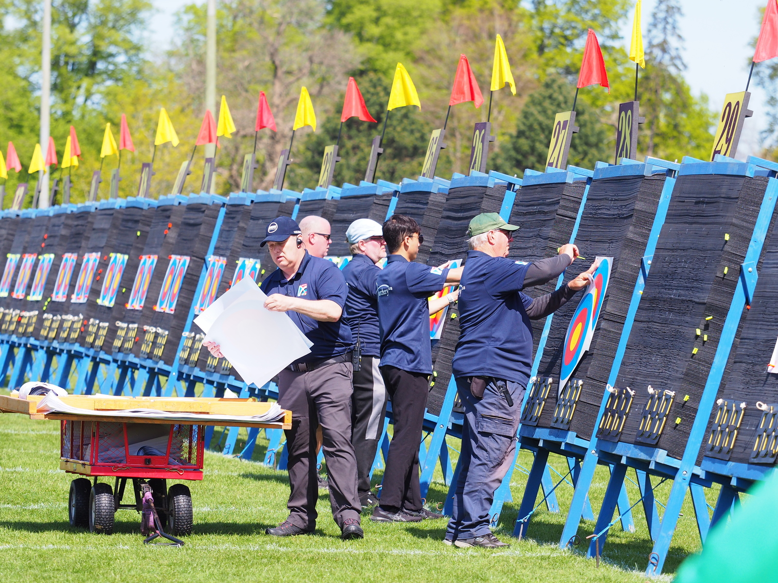Volunteers putting up target faces