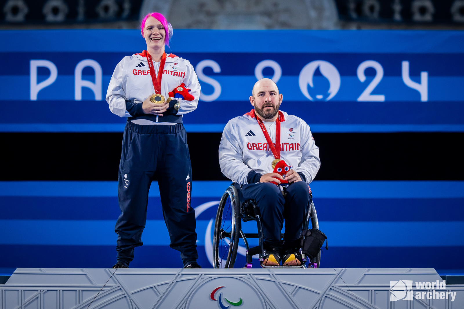 Jodie Grinham and Nathan Macqueen on the podium in Paris